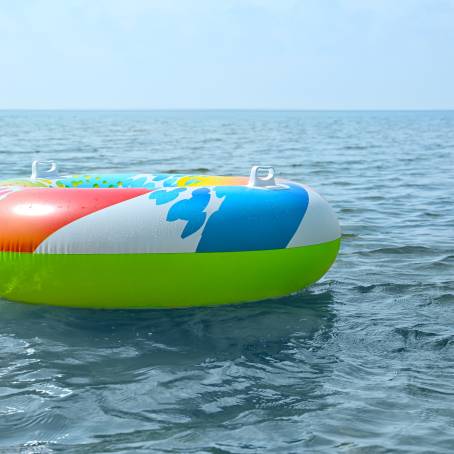 Sunny Escape Inflatable Ring Floating in Sea Waves for Summer Fun