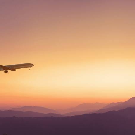 Sunset Sky with Aircraft Silhouette