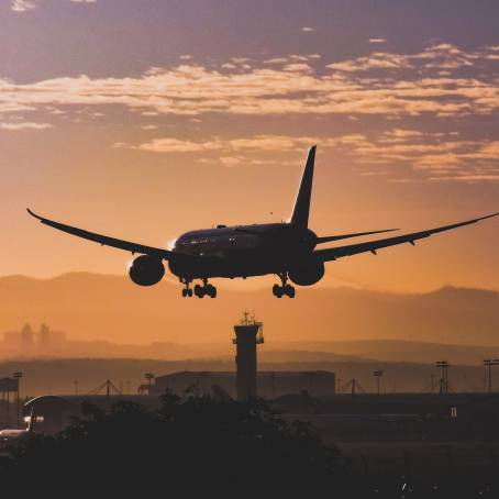 Sunset with Plane Blue Sky Scene