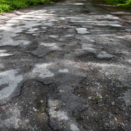 Surface Repair for Cracked Asphalt and Pothole Management