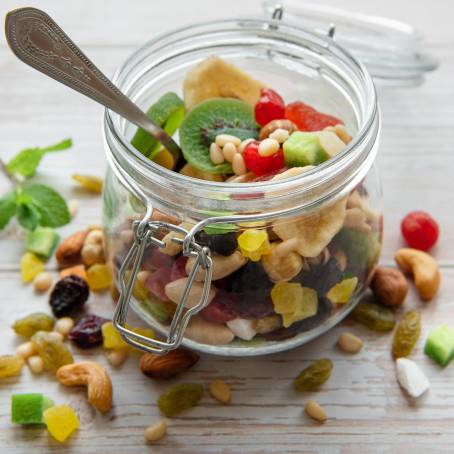 Sweet Nutty Cookies with Dried Fruits in a Healthy Glass Jar