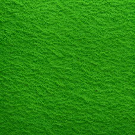 Textured Green Felt Surface Close Up of Fabric Background