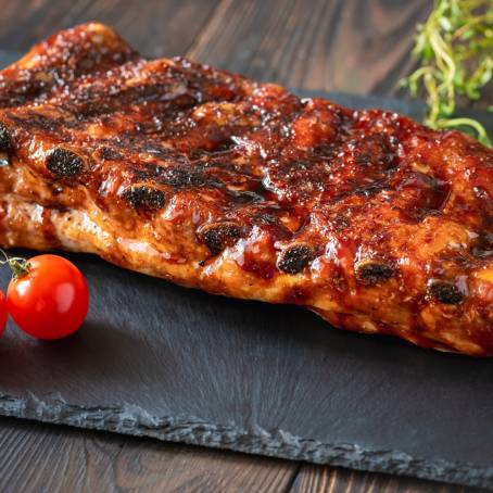 Top View of Delicious Grilled Pork on White Background Perfect for Food Content