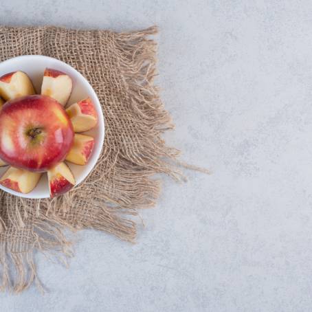 Top View of Fresh Red Apples with Slices Healthy and Delicious Fruit Background