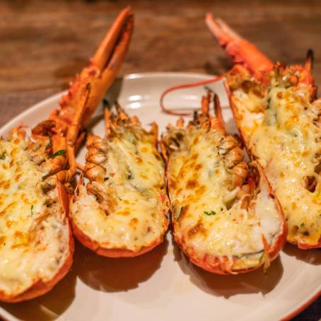 Top View of Juicy Grilled Lobster on White Plate