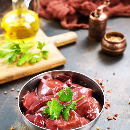 Top View of Raw Pork Liver Freshly Isolated on White Background, Perfect for Cooking