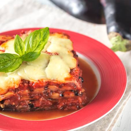 Traditional Italian Parmigiana di Melanzane, Baked Eggplant with Cheese and Tomatoes