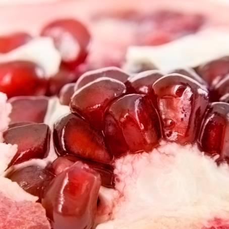 True Photo of Pomegranate Seeds with Macro Detail Isolated on White Background Full Depth