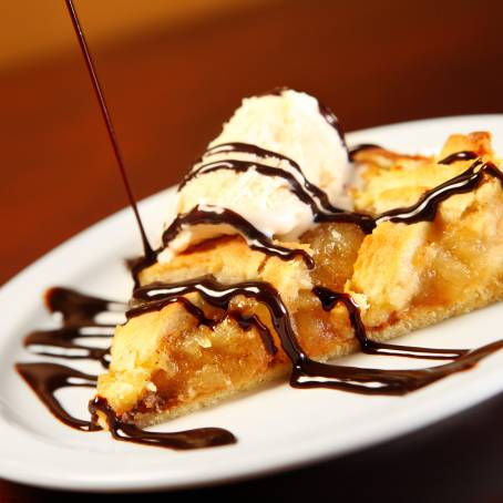 Vanilla Ice Cream and Apple Pie Slice on White Plate