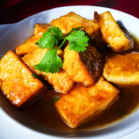 Vibrant StirFried Tofu with Sesame Seeds and Mixed Greens