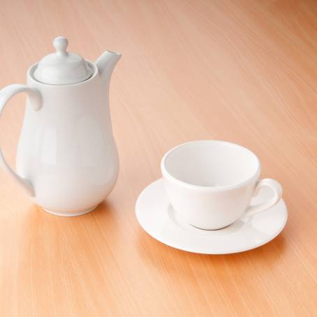 Vintage White Ceramic Tea Pot on Wooden Table Timeless Top View