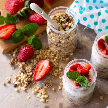 Warm Homemade Granola with Milk for Breakfast