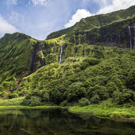 Waterfalls and Poco Ribeira do Ferreiro Lake in Azores