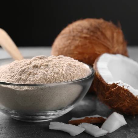 White Background Coconut Half, Slice, and Piece with Leaf Isolated, Full Depth of Field Focus