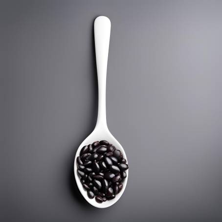 White Ceramic Spoon with Black Beans on Black Background Detailed Close Up Food Photography