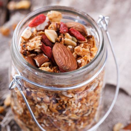 Wholesome Cookies with Dried Fruits and Nuts in a Glass Jar