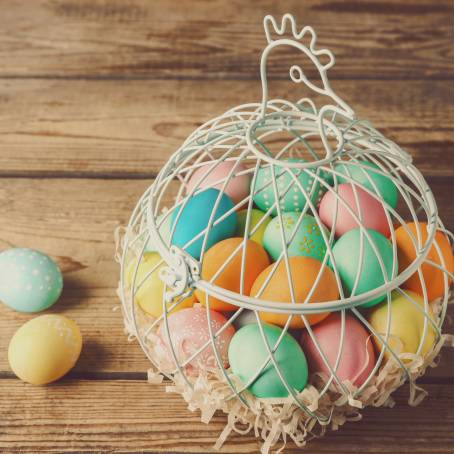 Wooden Background with Easter Basket and Eggs