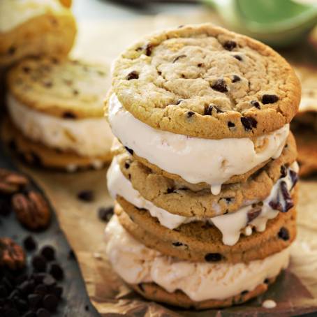 Yummy Ice Cream Sandwiches with Nuts, Caramel, and Chocolate Chip Cookies